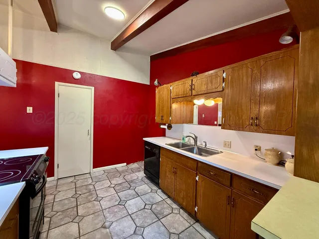 a bathroom with a sink a mirror and a shower