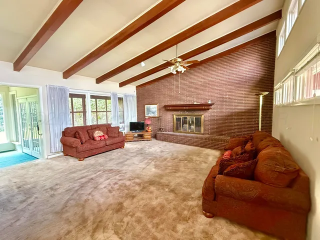 a bed room with furniture and a window