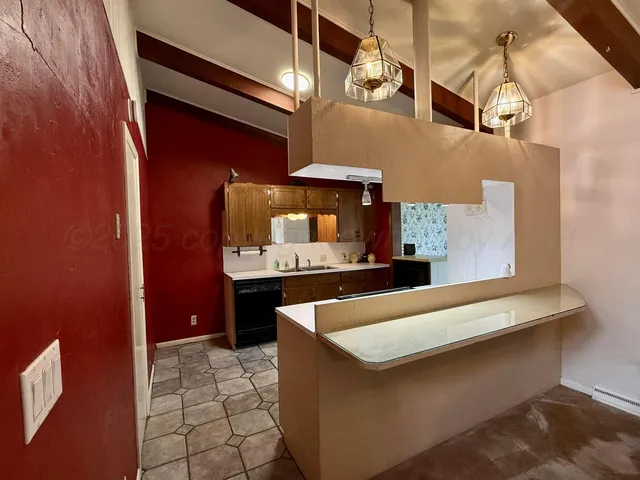 a view of living room with furniture and a fireplace