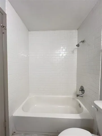 a bathroom with a bathtub