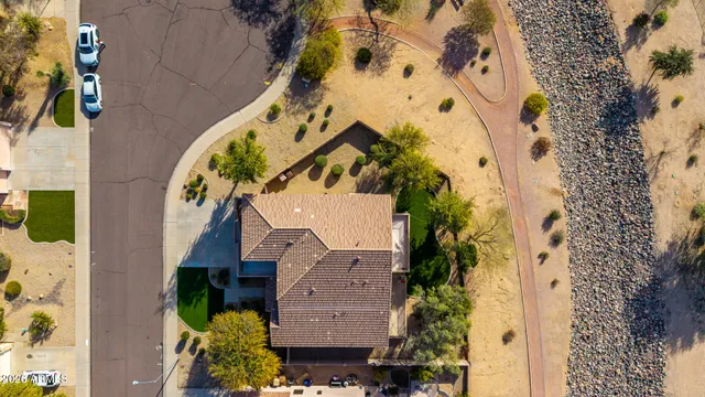 a view of a patio with couches table and chairs and potted plants