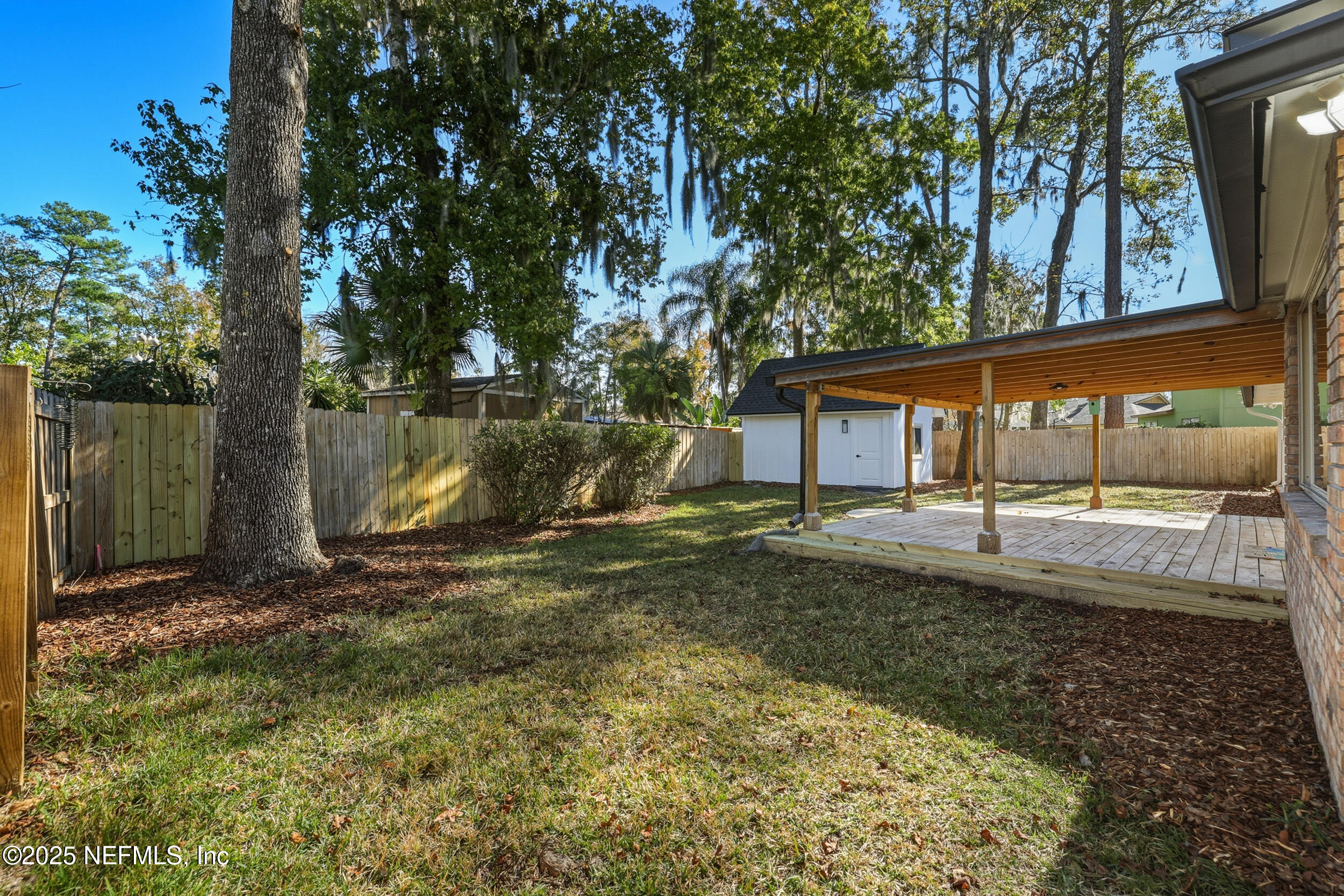 11455 Scott Mill Road Jacksonville, FL 32223 - Photo 12 of 46 front view of a house with a yard