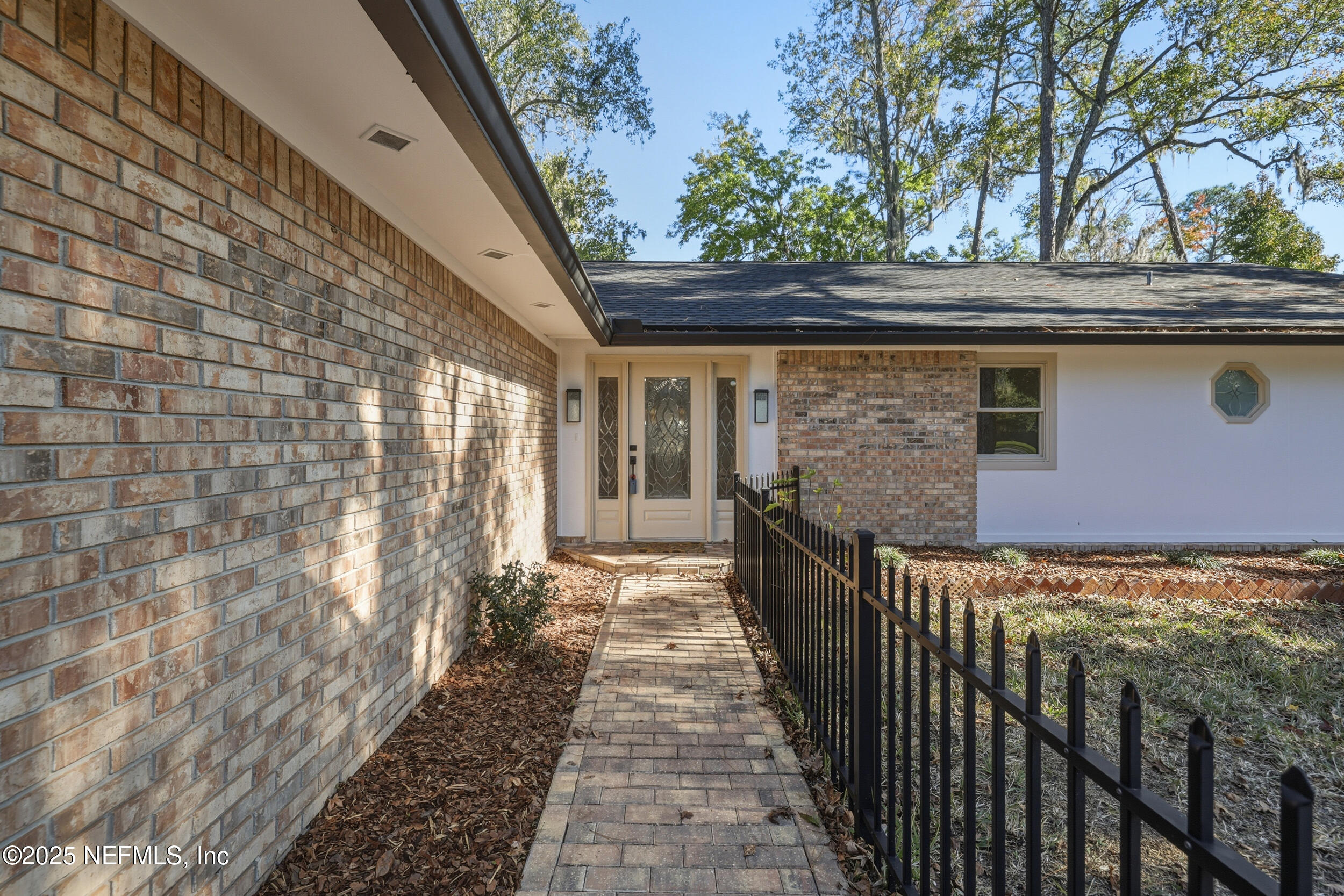11455 Scott Mill Road Jacksonville, FL 32223 - Photo 14 of 46 a view of a pathway of a house