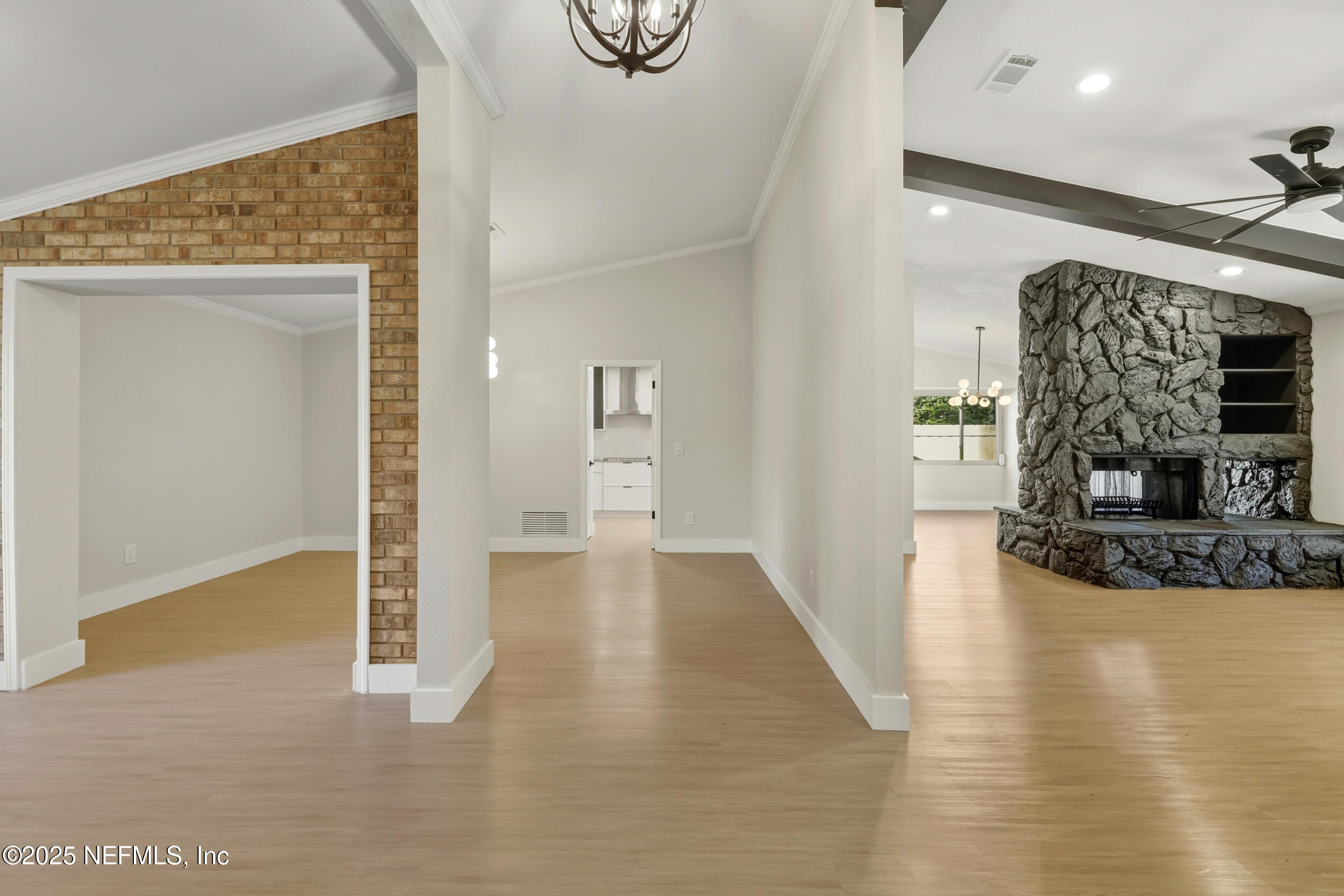 11455 Scott Mill Road Jacksonville, FL 32223 - Photo 16 of 46 a view of a livingroom with wooden floor