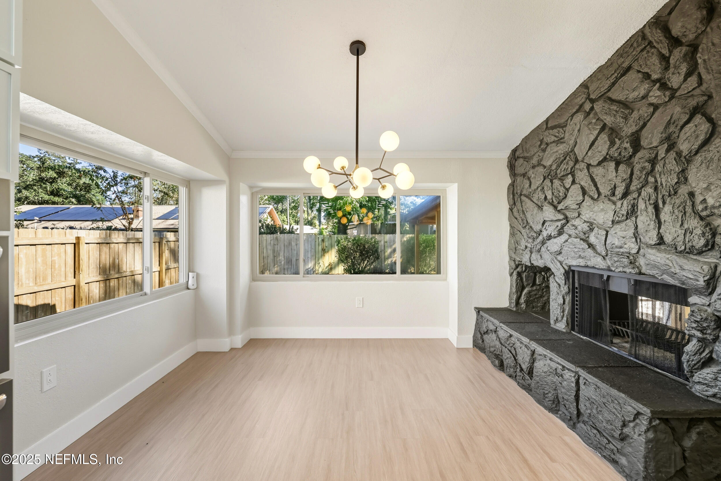 11455 Scott Mill Road Jacksonville, FL 32223 - Photo 22 of 46 a view of a room with window and wooden floor