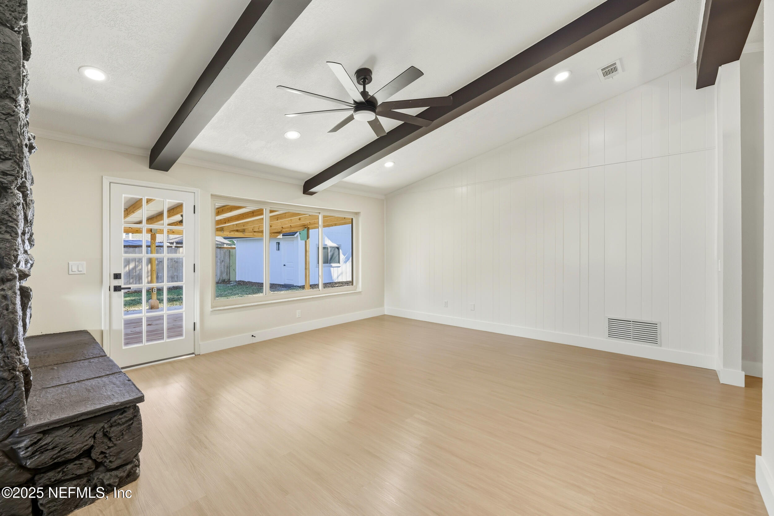 11455 Scott Mill Road Jacksonville, FL 32223 - Photo 24 of 46 a view of an empty room with a window