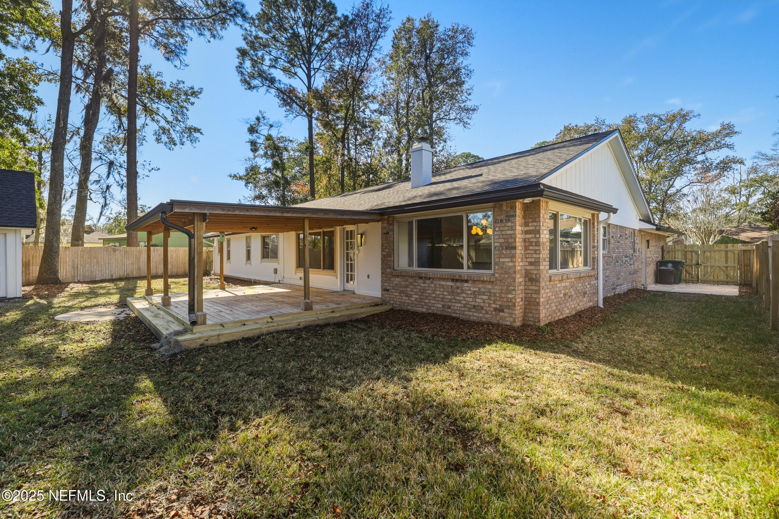 11455 Scott Mill Road Jacksonville, FL 32223 - Photo 7 of 46 a front view of a house with garden