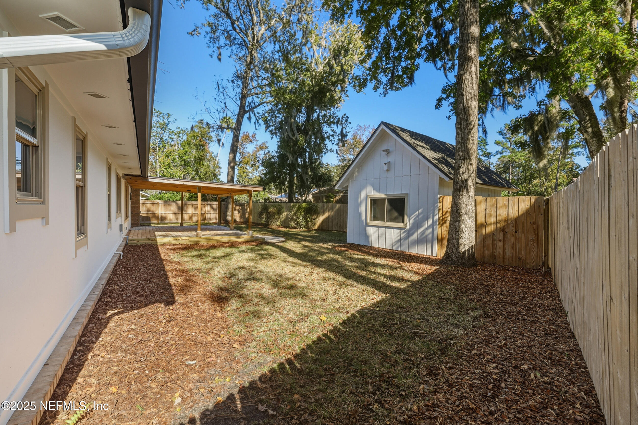 11455 Scott Mill Road Jacksonville, FL 32223 - Photo 10 of 46 a front view of a house with a yard