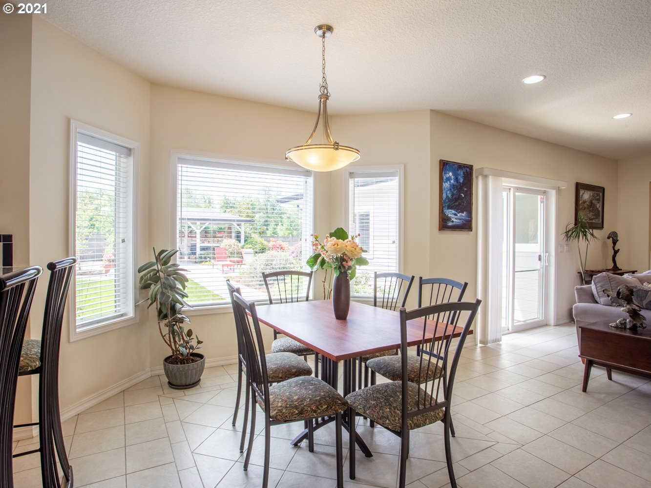 18509 Northeast Risto Road Battle Ground, WA 98604 - Photo 23 of 32 a dining room with furniture and window