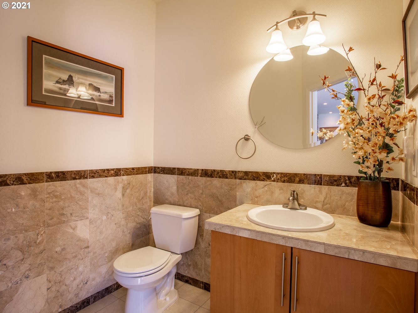 18509 Northeast Risto Road Battle Ground, WA 98604 - Photo 29 of 32 a bathroom with a sink mirror and toilet
