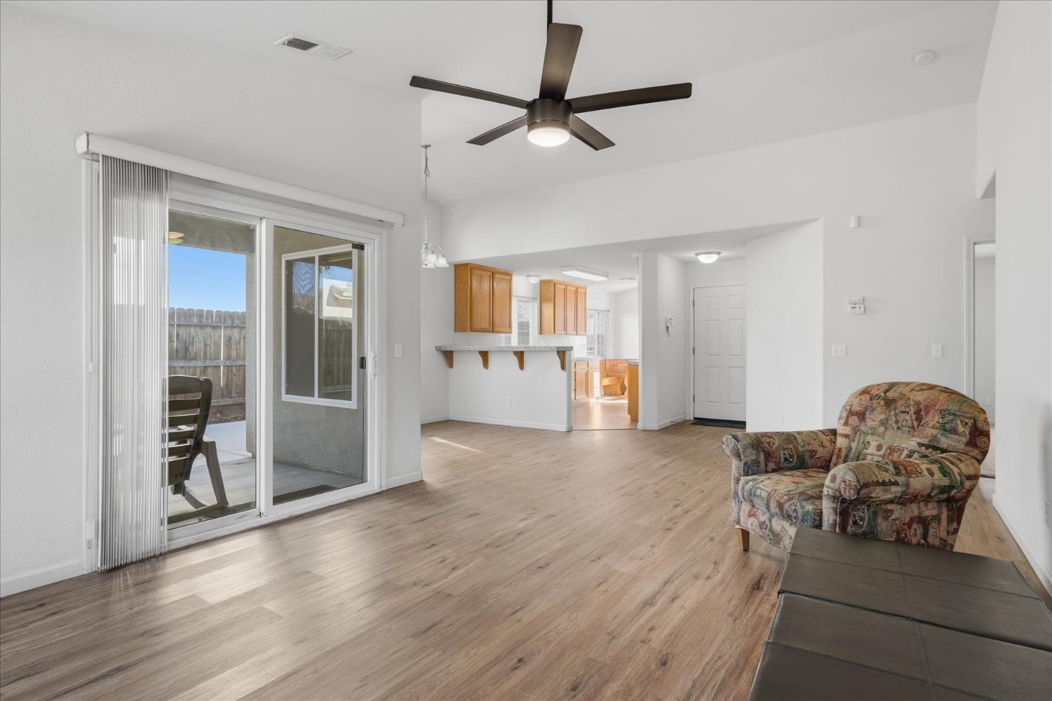 988 Monterey Street Madera, CA 93637 - Photo 7 of 36 a view of livingroom with furniture and ceiling fan