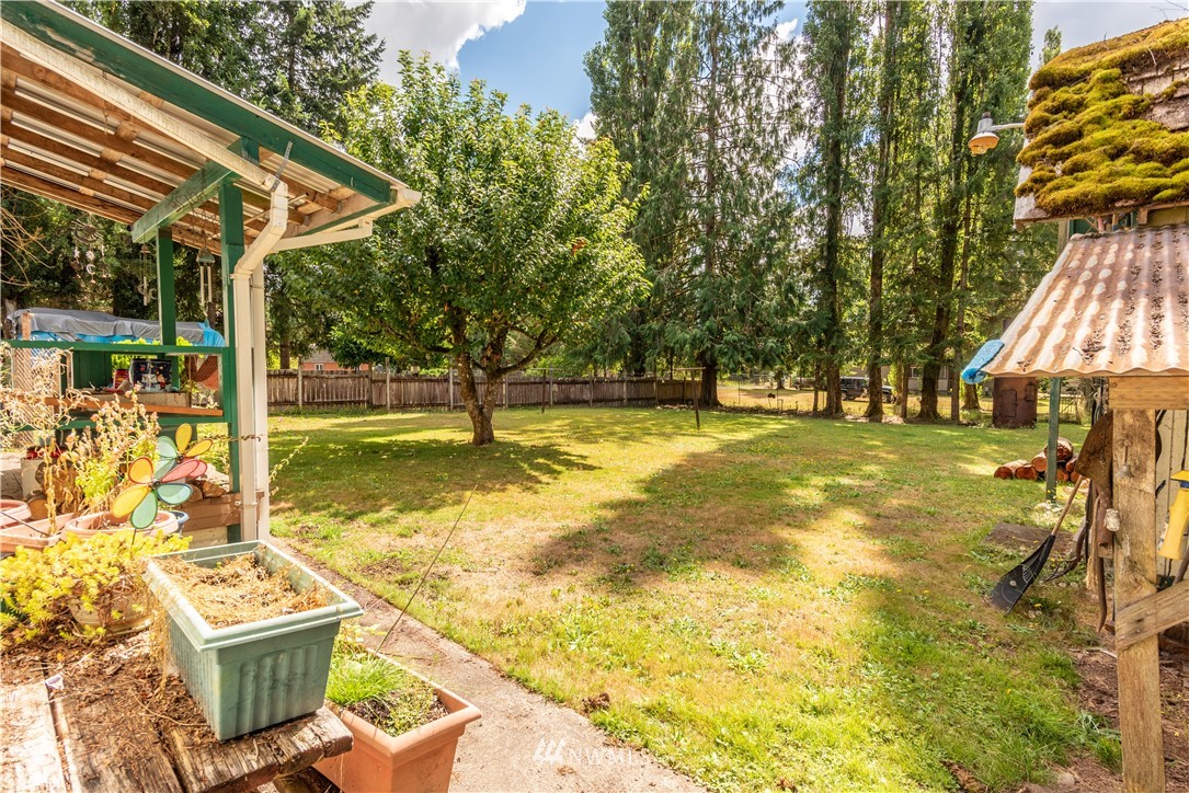 115 Island Road Toledo, WA 98591 - Photo 15 of 22 a view of a swimming pool with a patio