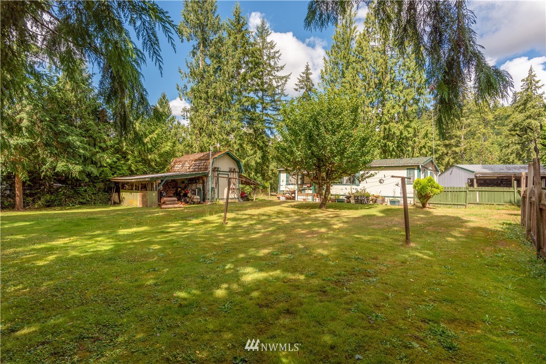 115 Island Road Toledo, WA 98591 - Photo 17 of 22 a view of a trees with a yard