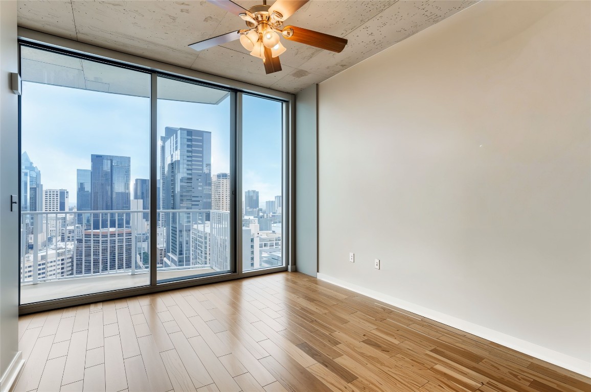 360 Nueces Street, Unit 2607 Austin, TX 78701 - Photo 13 of 23 a view of a room with wooden floor