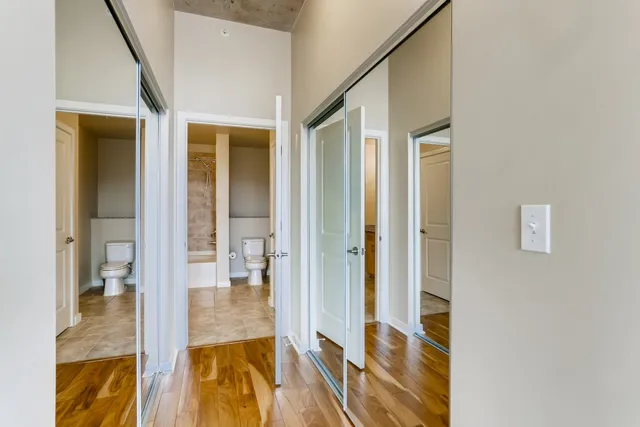 a bathroom with a glass shower door