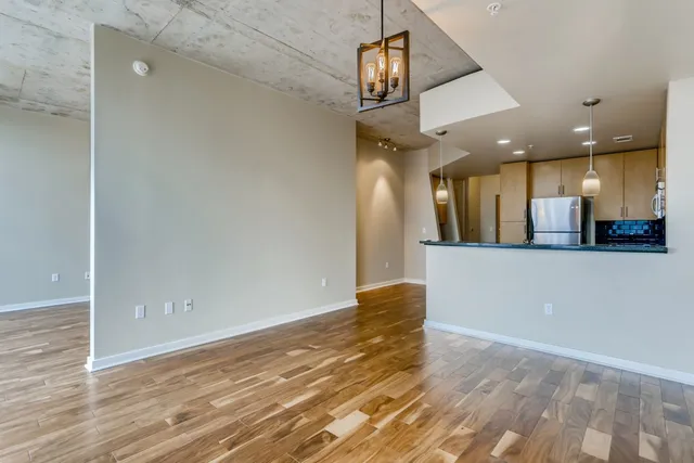 a view of a kitchen and a window