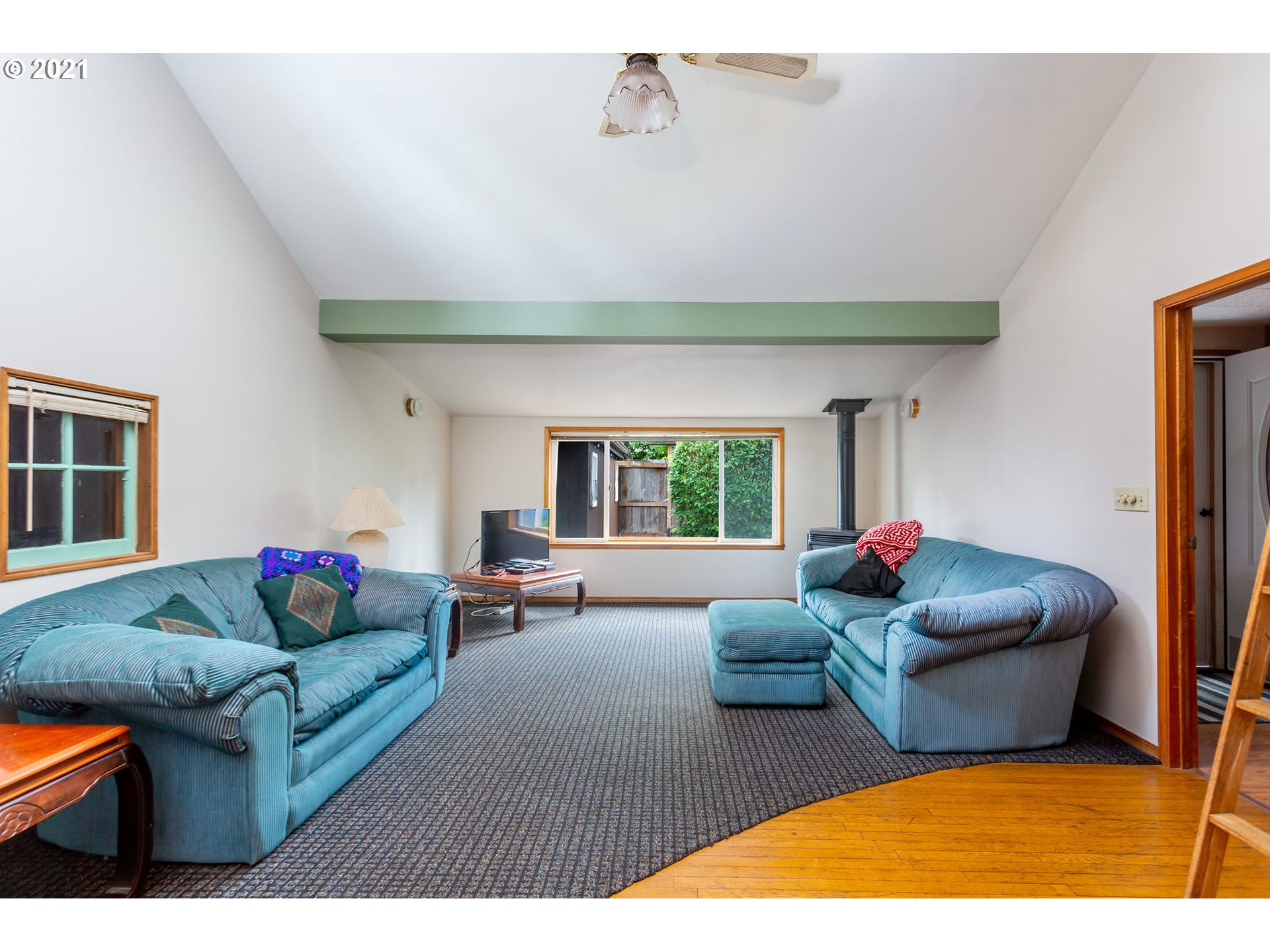 477 Southwest Hawthorn Road Estacada, OR 97023 - Photo 3 of 24 a living room with furniture and a large window