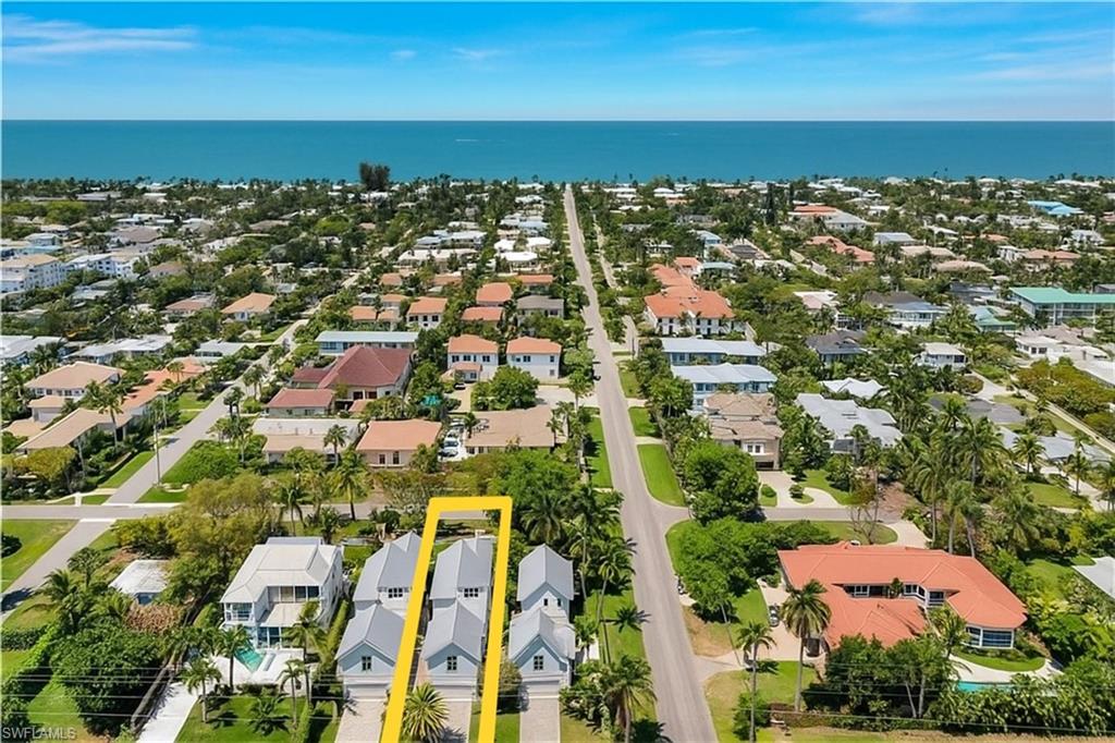 1021 6th Street South Naples, FL 34102 - Photo 42 of 44 an aerial view of residential building and ocean