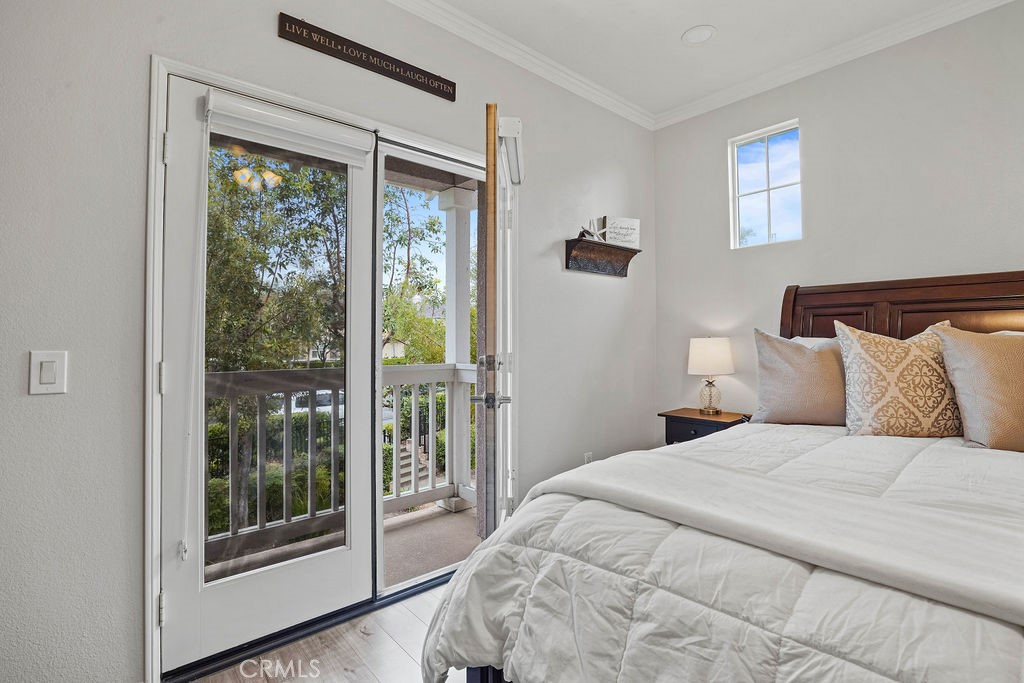 7701 Chambray Place, Unit 3 Rancho Cucamonga, CA 91739 - Photo 23 of 52 a bedroom with a large bed and a window