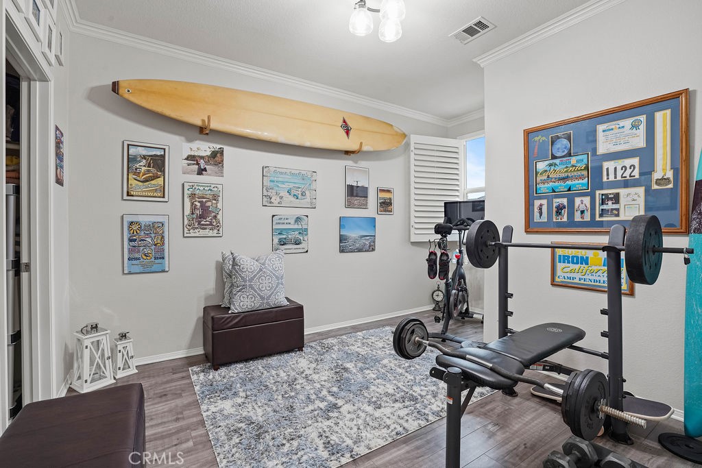7701 Chambray Place, Unit 3 Rancho Cucamonga, CA 91739 - Photo 30 of 52 a view of a workspace with furniture and a window
