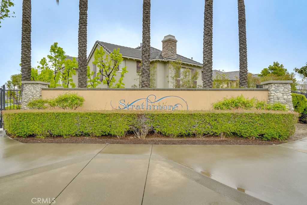 7701 Chambray Place, Unit 3 Rancho Cucamonga, CA 91739 - Photo 48 of 52 a view of a garden with tall buildings