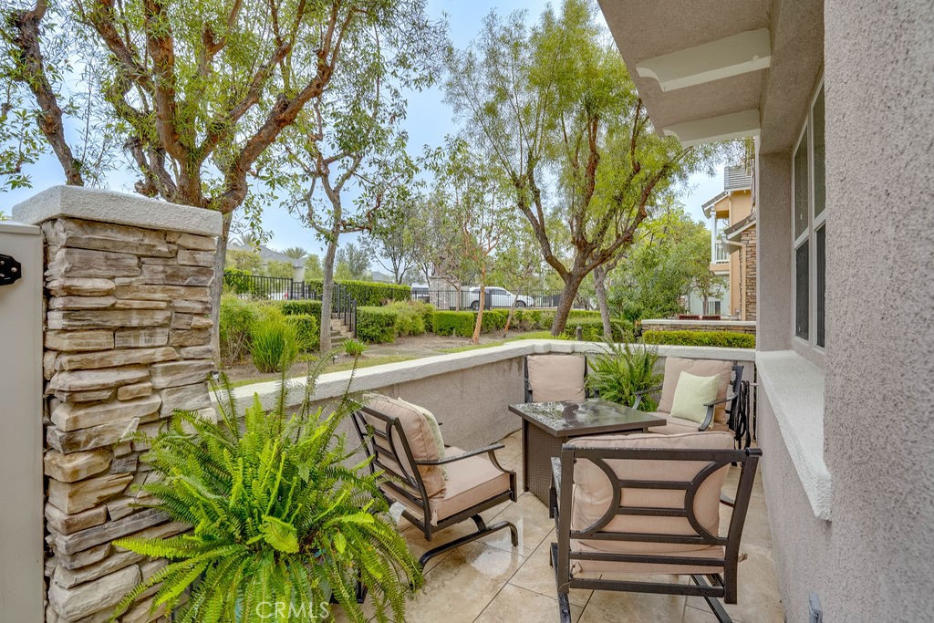 7701 Chambray Place, Unit 3 Rancho Cucamonga, CA 91739 - Photo 7 of 52 a view of swimming pool with outdoor seating and plants
