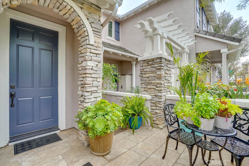 7701 Chambray Place, Unit 3 Rancho Cucamonga, CA 91739 - Photo 8 of 52 a front view of a house