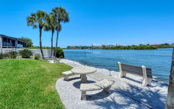 a view of a lake with a outdoor space
