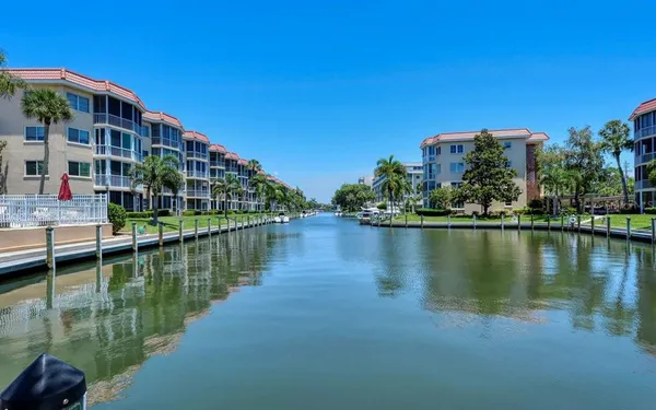 a view of a lake with a building in the background