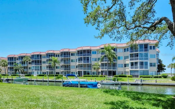 a view of a lake with a big yard