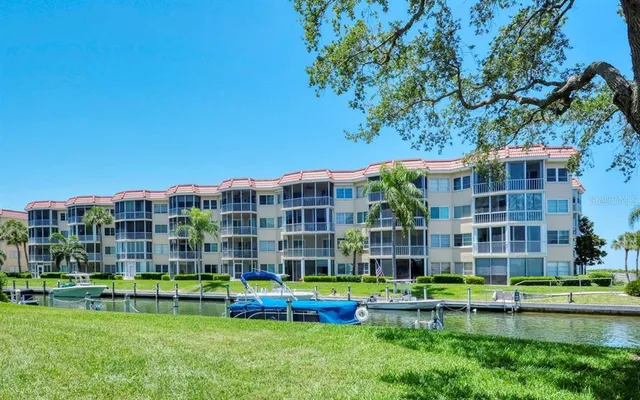 a view of a lake with a big yard
