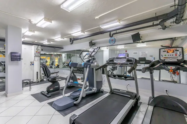 a view of a backyard with sitting area