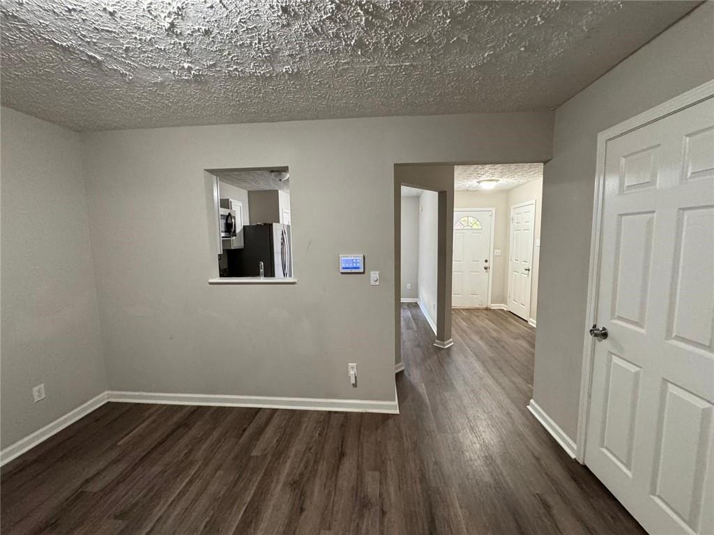 3833 Waldrop Lane Decatur, GA 30034 - Photo 12 of 20 wooden floor in an empty room with a window