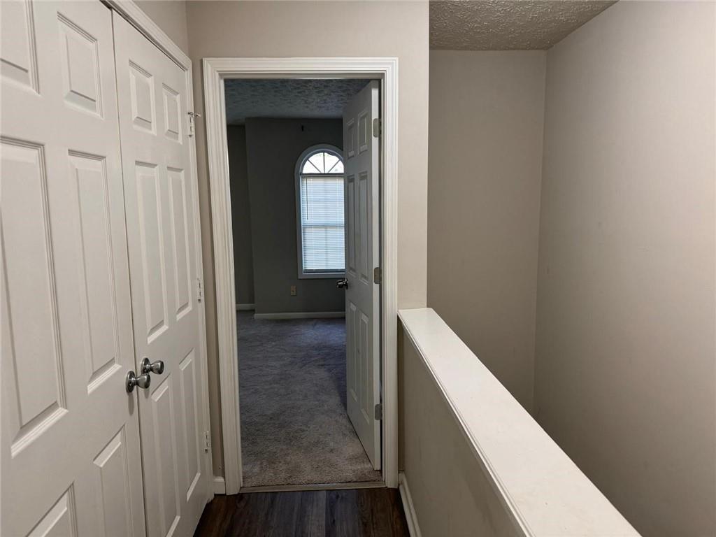 3833 Waldrop Lane Decatur, GA 30034 - Photo 15 of 20 a view of a hallway with wooden floor