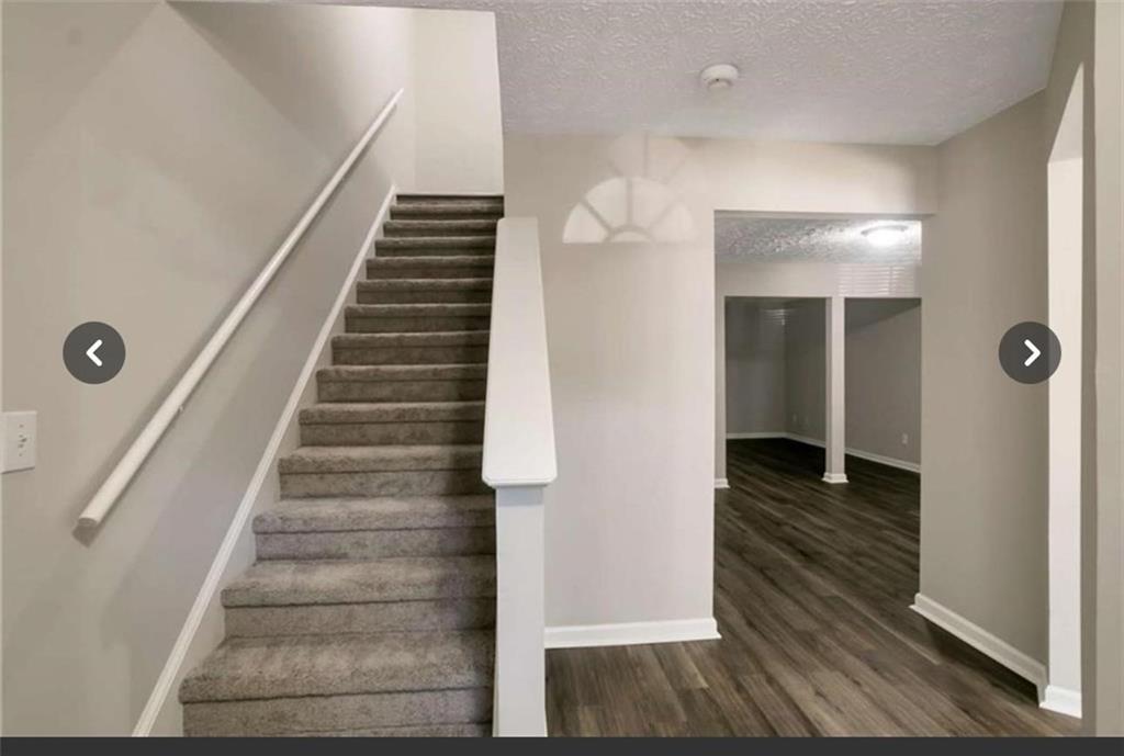 3833 Waldrop Lane Decatur, GA 30034 - Photo 2 of 20 a view of entryway and hall with wooden floor