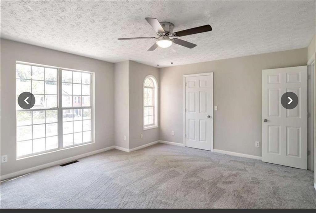 3833 Waldrop Lane Decatur, GA 30034 - Photo 5 of 20 a view of an empty room with a window