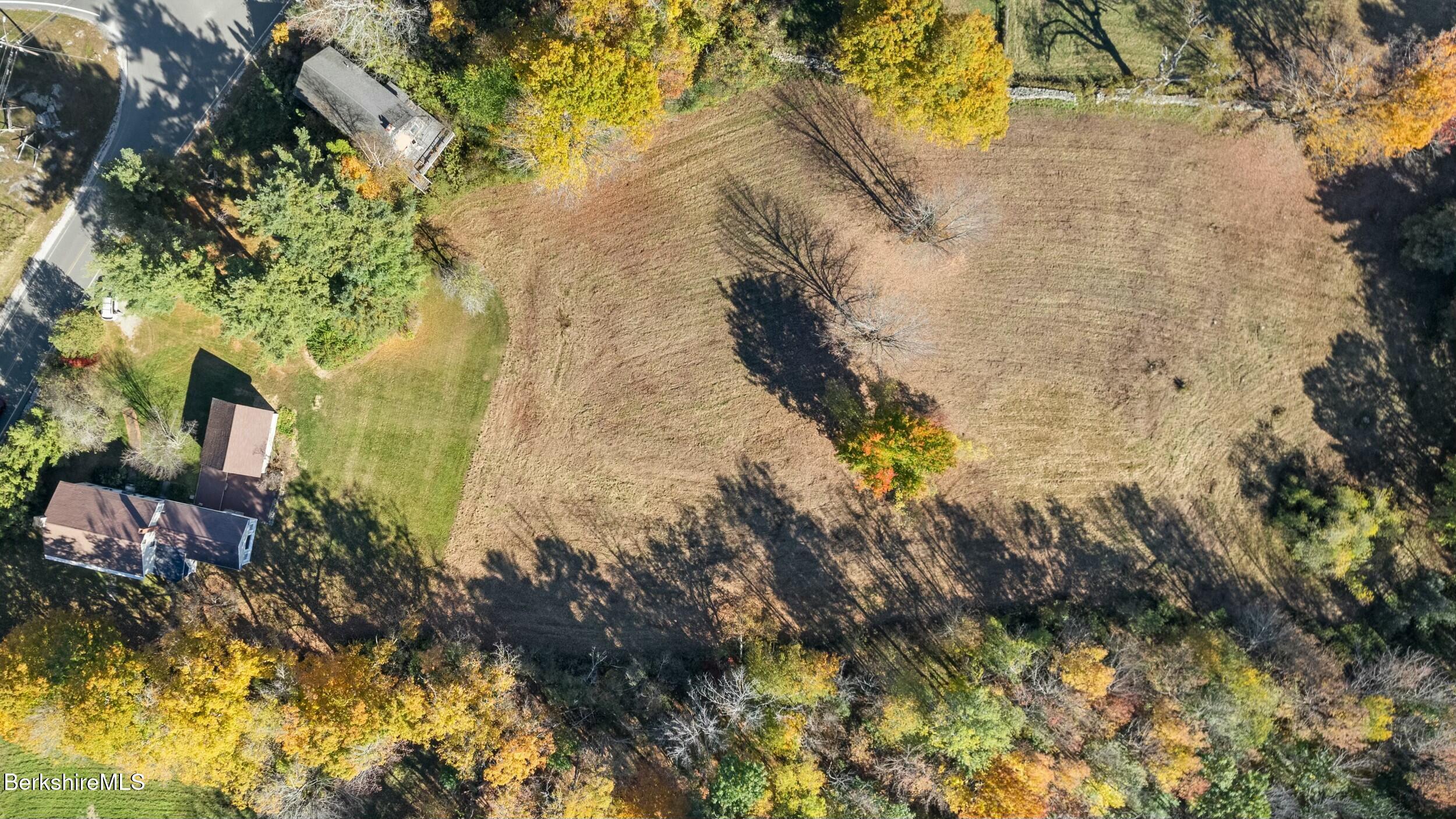 191 Sandisfield Road Sandisfield, MA 01255 - Photo 4 of 42 a aerial view of a residential houses with yard