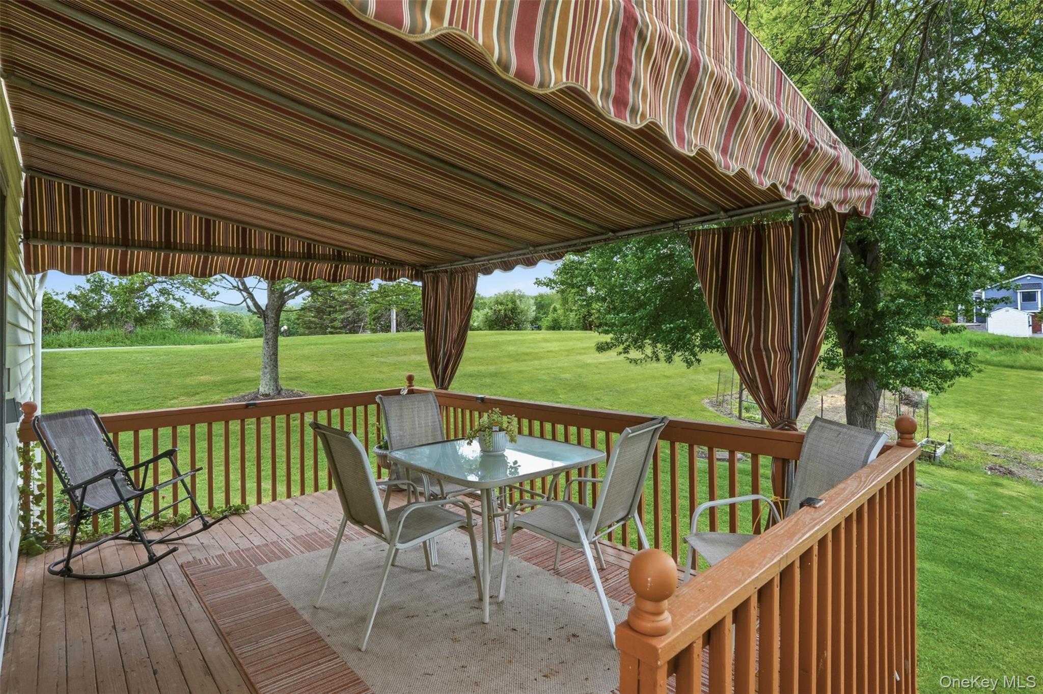 23 Old Cross Road Warwick, NY 10990 - Photo 9 of 34 Just off the dining area is a large deck complete with awning. Enjoy al fresco dining in the summer breeze and while listening to the sounds of evening nature