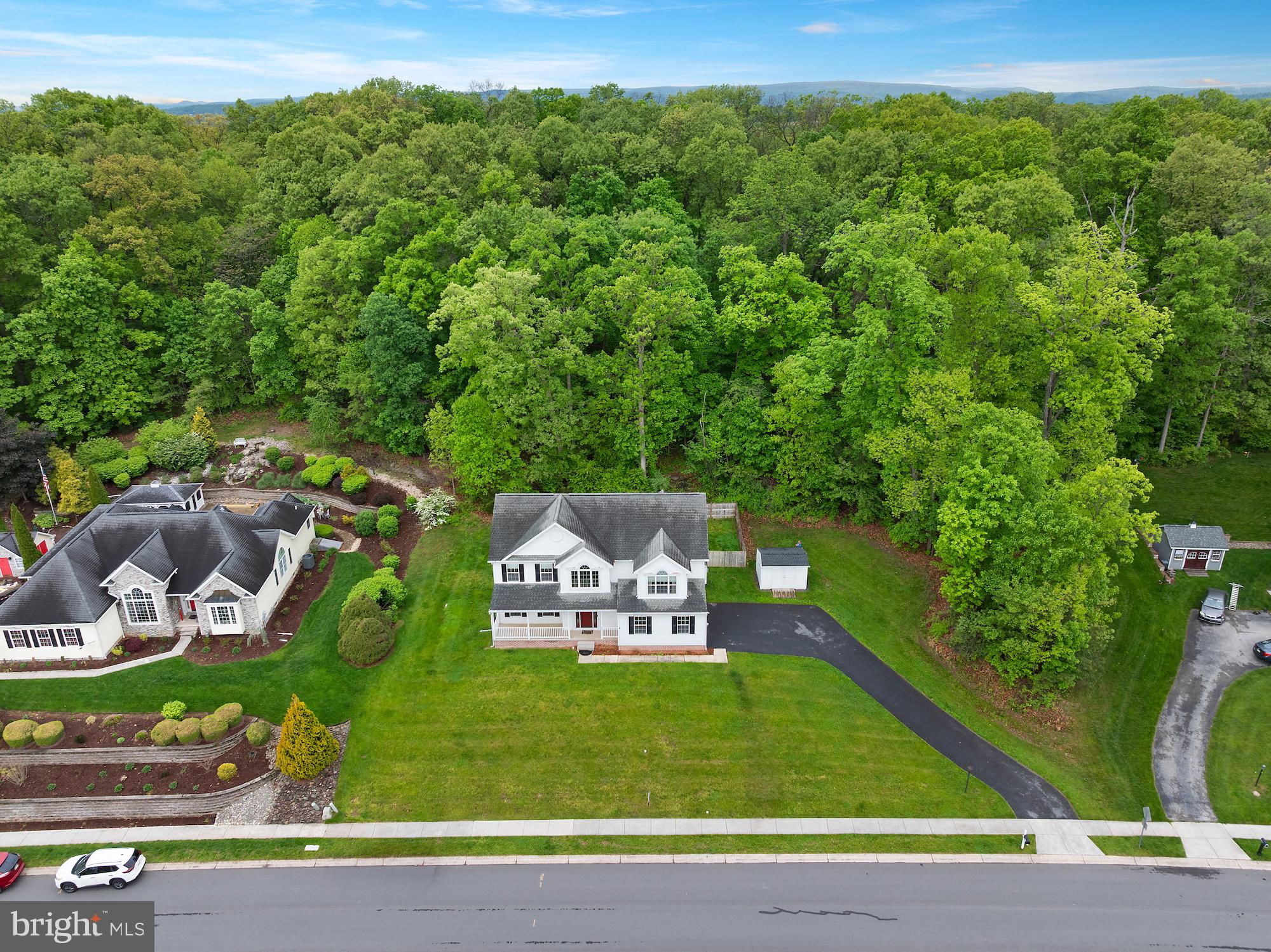 874 Boyds School Road Gettysburg, PA 17325 - Photo 9 of 62 Serene home nestled by lush greenery.