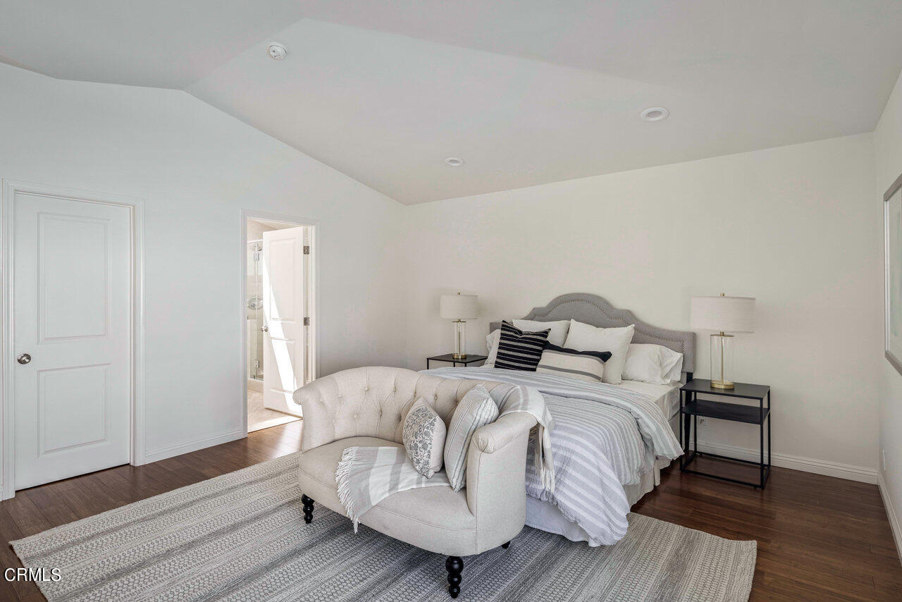 1260 Riviera Drive Pasadena, CA 91107 - Photo 10 of 28 a bedroom with a bed and wooden floor