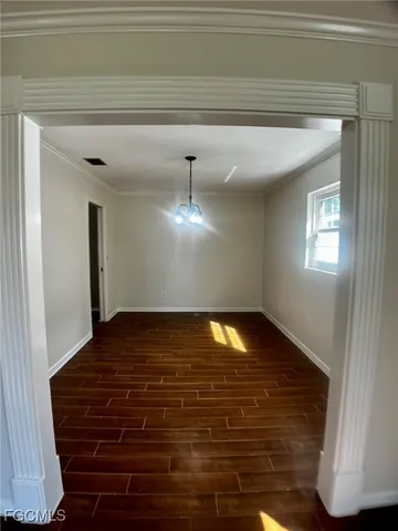 an empty room with an entryway