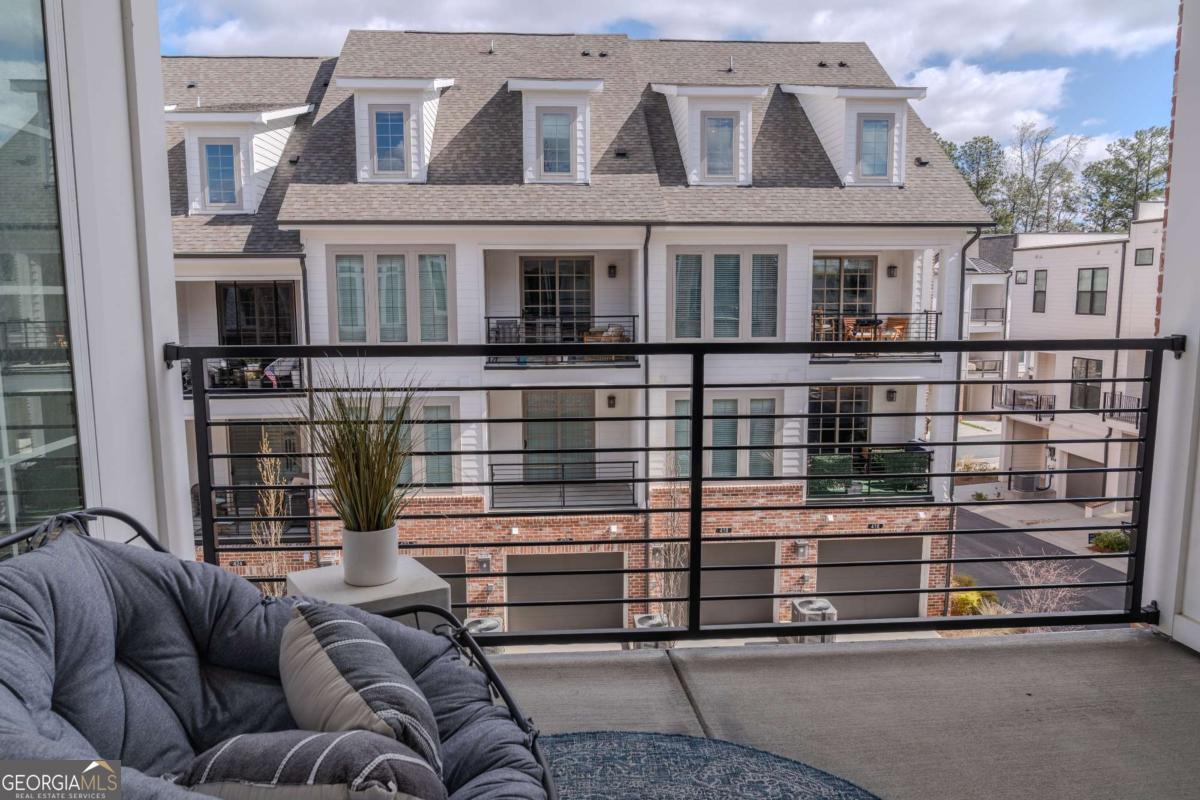 133 Devore Road, Unit 208 Alpharetta, GA 30009 - Photo 17 of 20 a outdoor space with a couch
