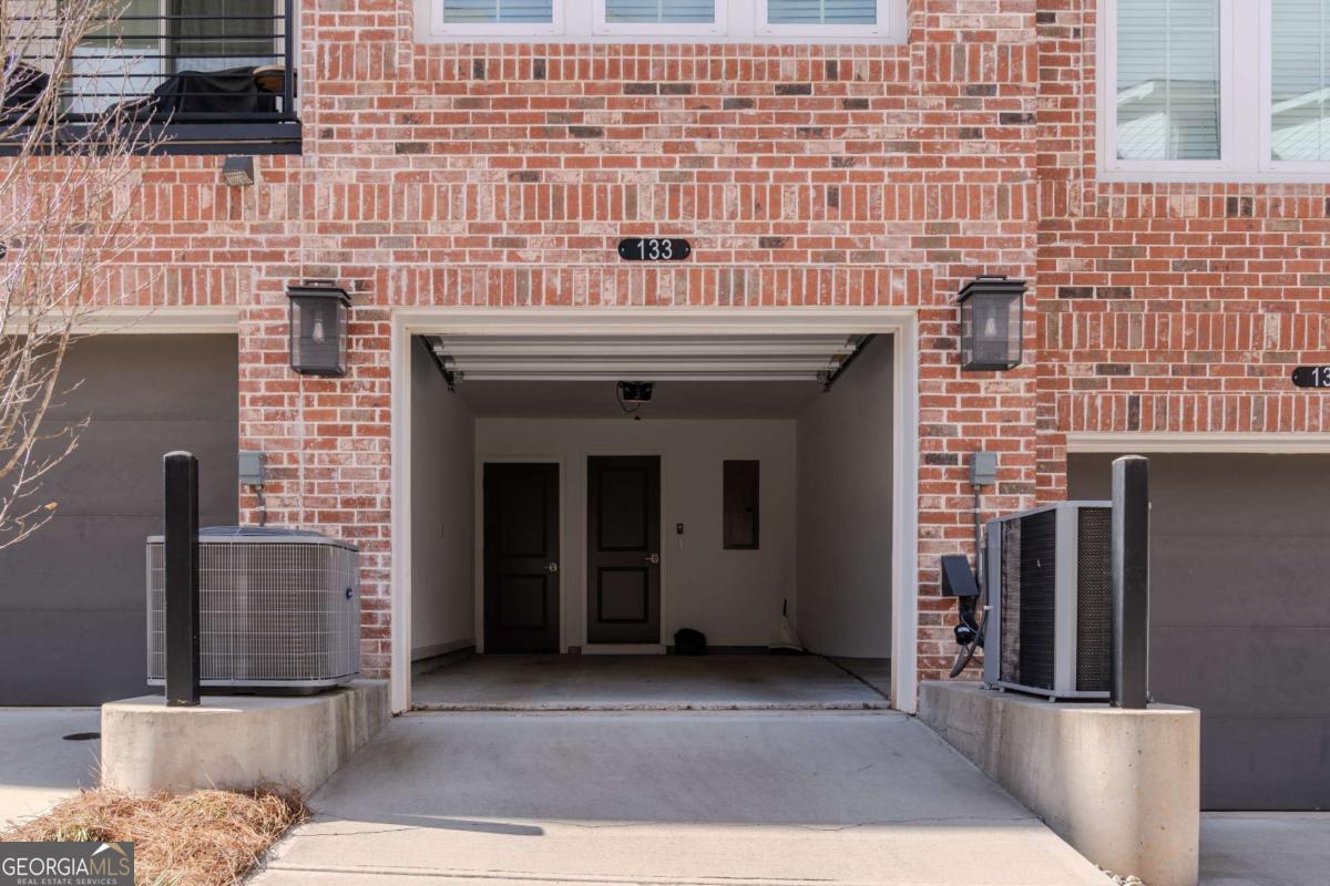 133 Devore Road, Unit 208 Alpharetta, GA 30009 - Photo 18 of 20 a front view of a building