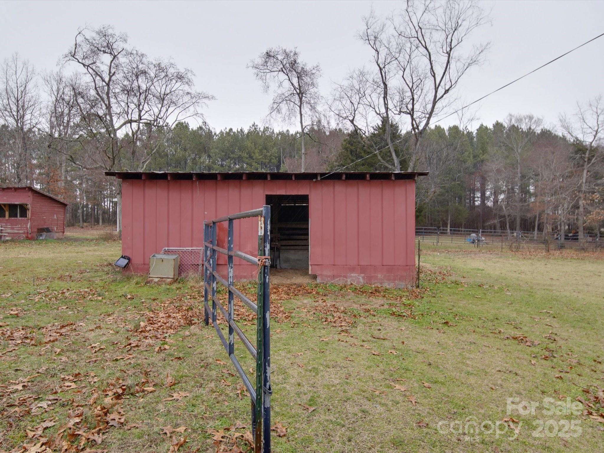 1231 Cherry Hill Road Mocksville, NC 27028 - Photo 25 of 31 a backyard of a house with lots of green space