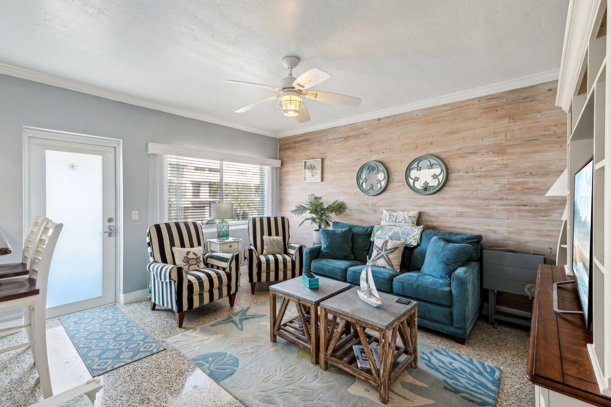 1006 Casuarina Road, Unit 11 Delray Beach, FL 33483 - Photo 6 of 19 a living room with furniture and wooden floor