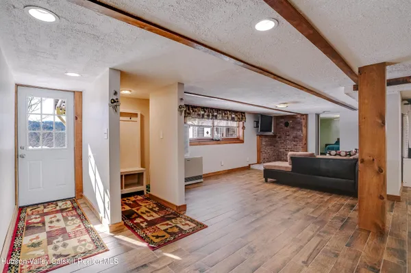 a living room with furniture and a rug