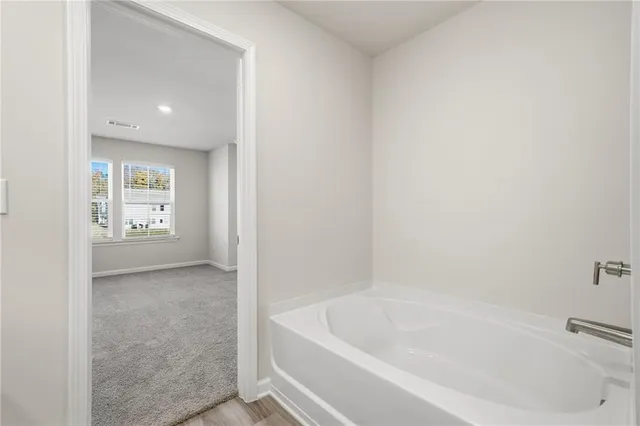 a bathroom with a bathtub