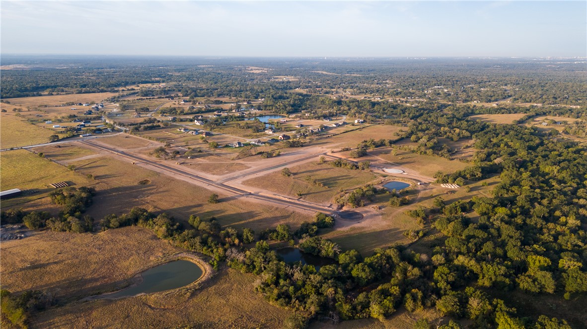 10237 Panther Creek Road Iola, TX 77861 - Photo 18 of 50 an aerial view of residential houses with outdoor space