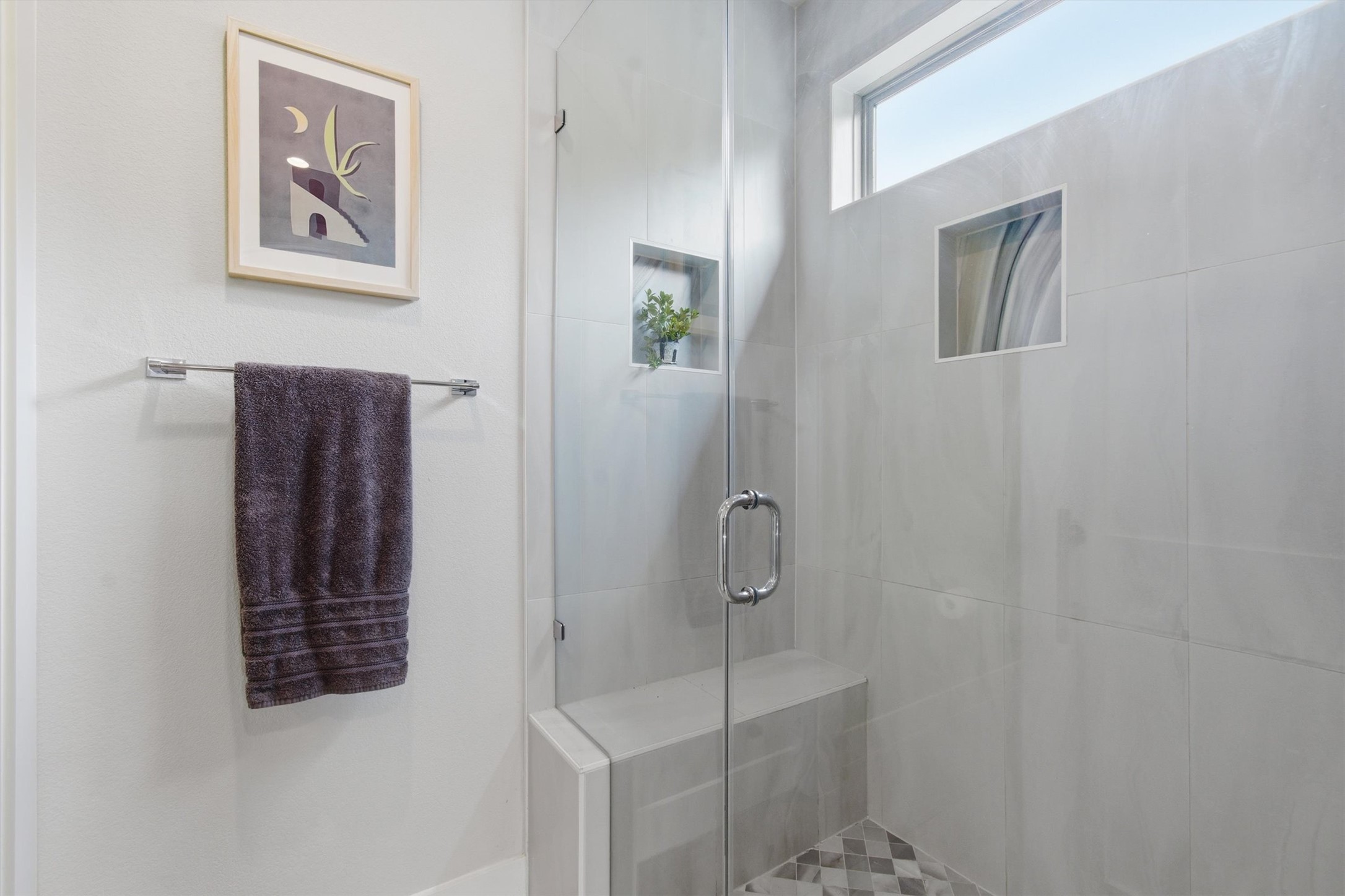 2710 Zaragosa Street, Unit A Austin, TX 78702 - Photo 18 of 29 Clean, modern bath with a frameless glass walk-in shower and full-height tile surround.