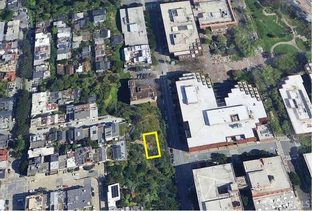 an aerial view of multiple houses with yard